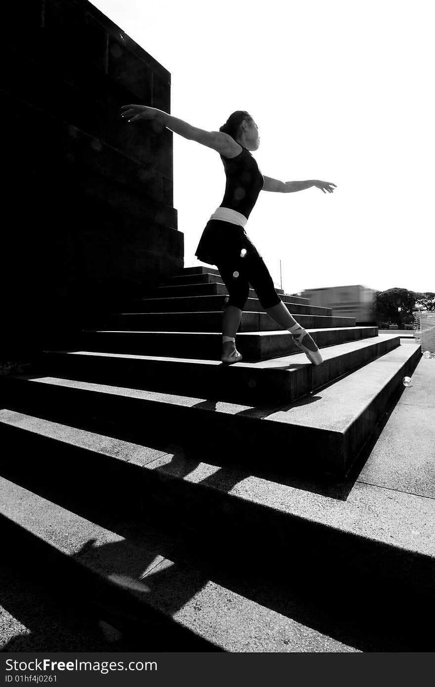 A female dancer dancing in the outdoors. A female dancer dancing in the outdoors