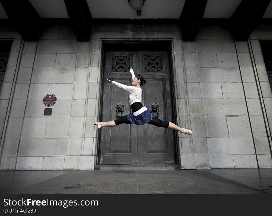 A female dancer dancing in the outdoors. A female dancer dancing in the outdoors