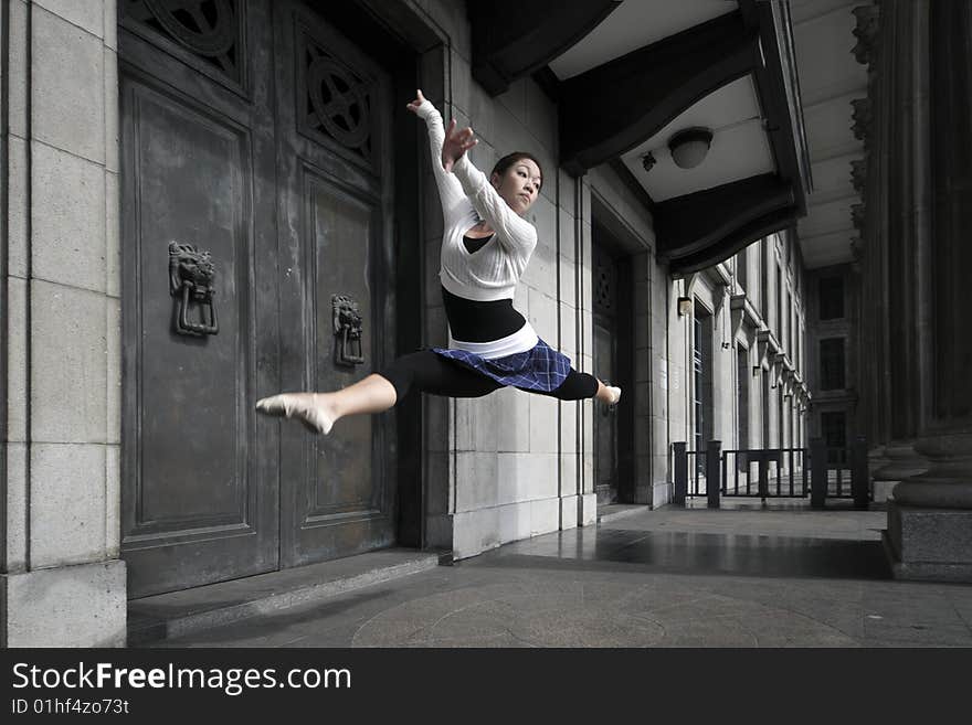 A female dancer dancing in the outdoors. A female dancer dancing in the outdoors