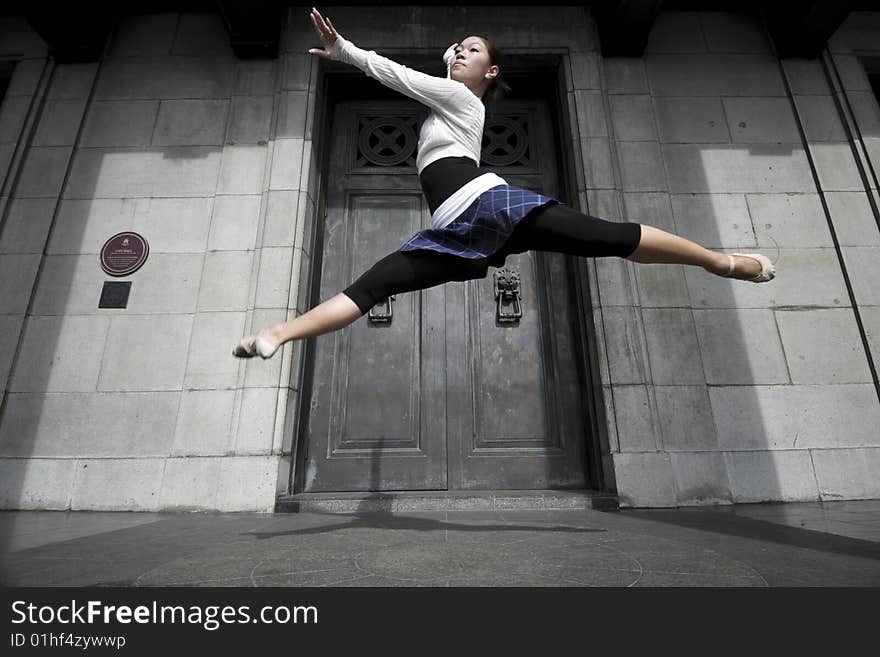 A female dancer dancing in the outdoors. A female dancer dancing in the outdoors