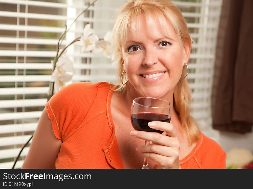 Attractive Blond With A Glass Of Wine