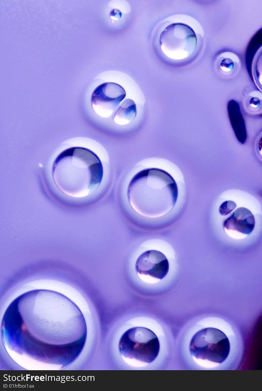 Water drops on blue background