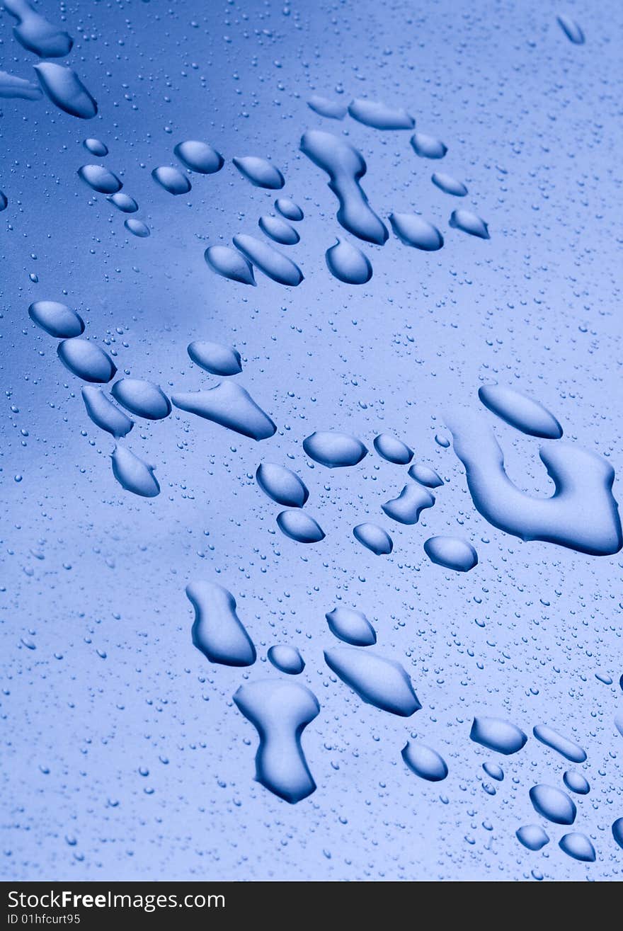 Water drops on blue background