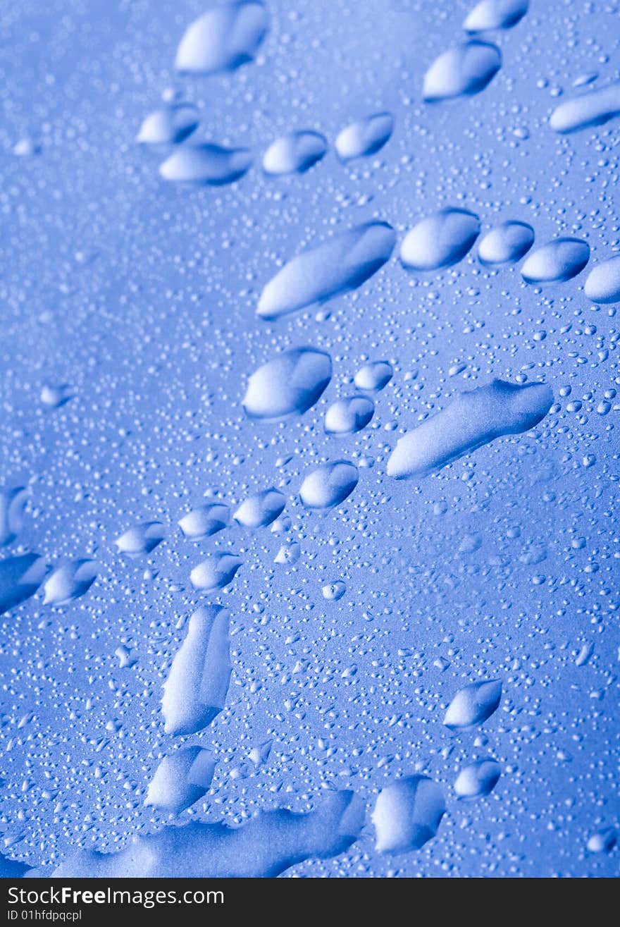 Water drops on blue background