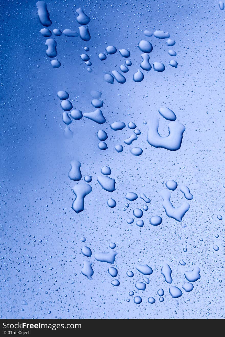 Water drops on blue background