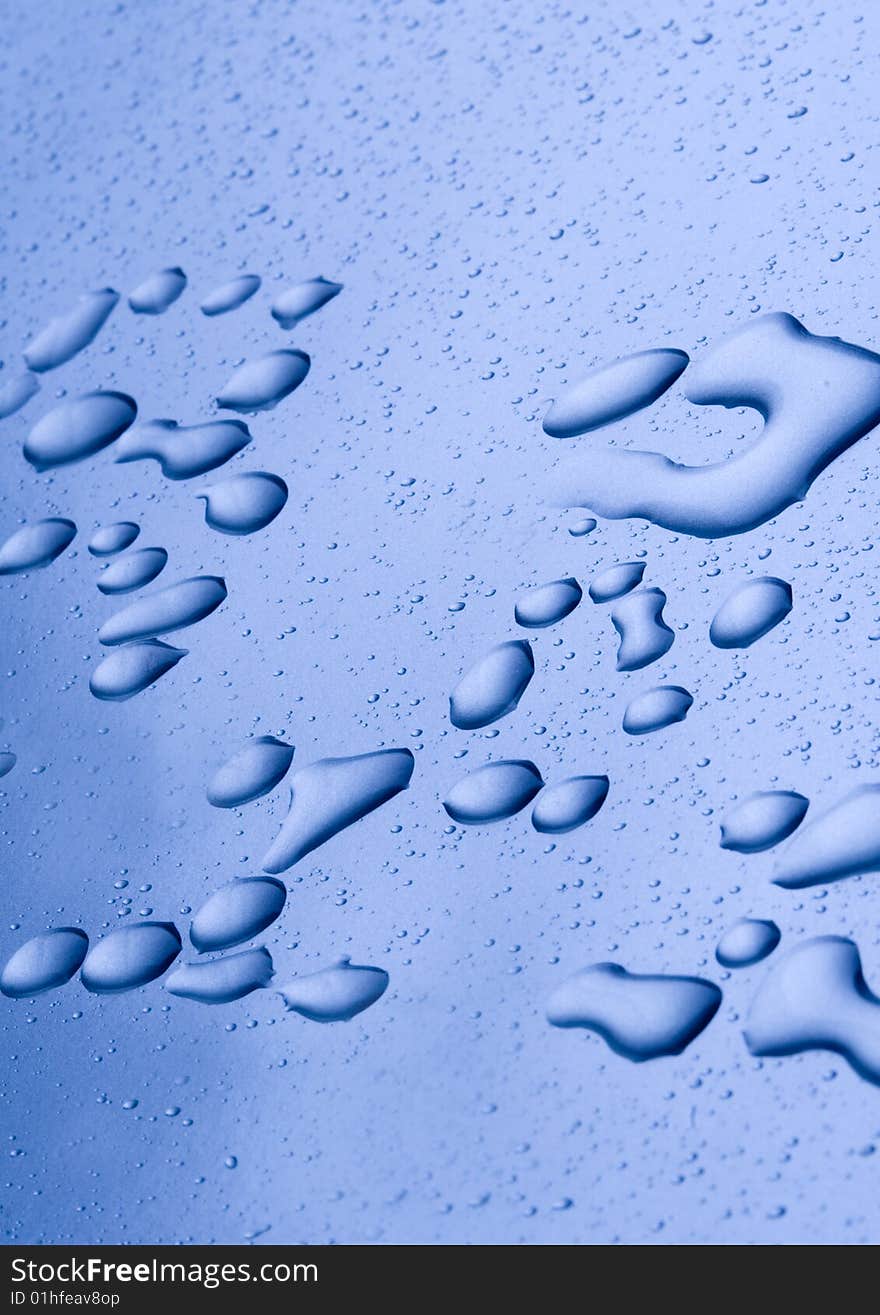 Water drops on blue background