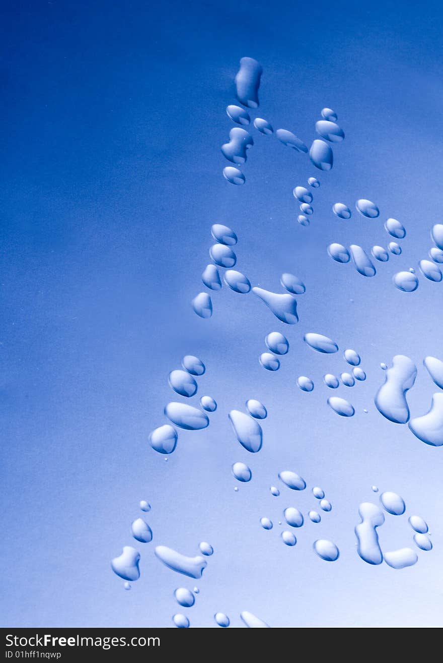 Water drops on blue background