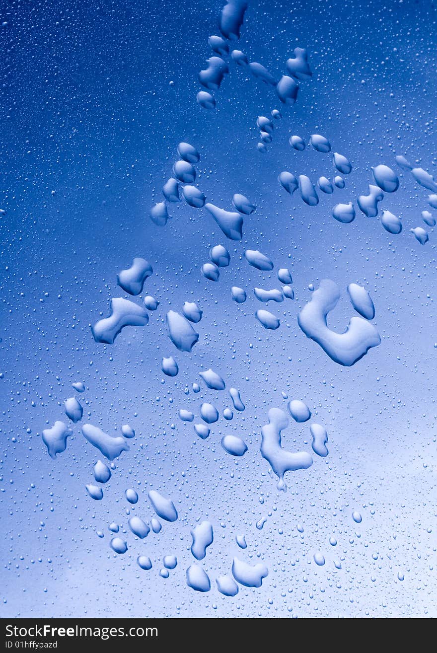 Water drops on blue background