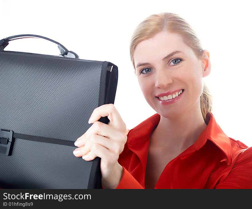 The beautiful girl in red holds in hands a black portfolio