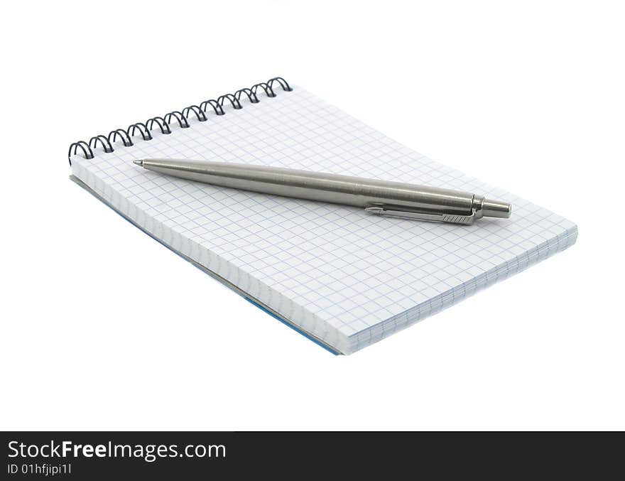 Notebook And Pen On It Isolated Over White