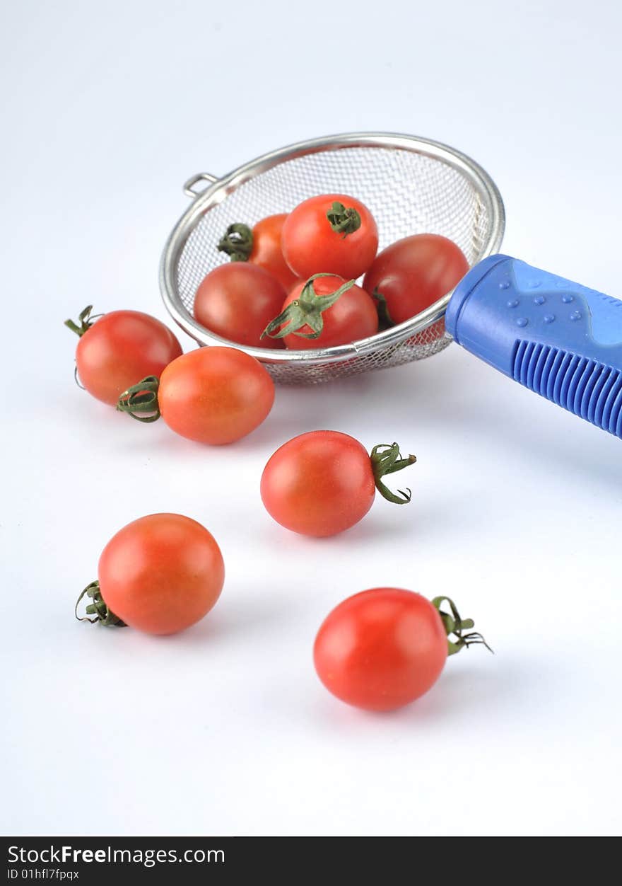 Cherry tomatoes on white background