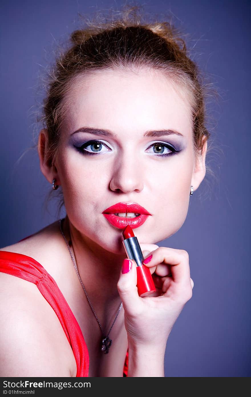 Lovely young woman with red lipstick