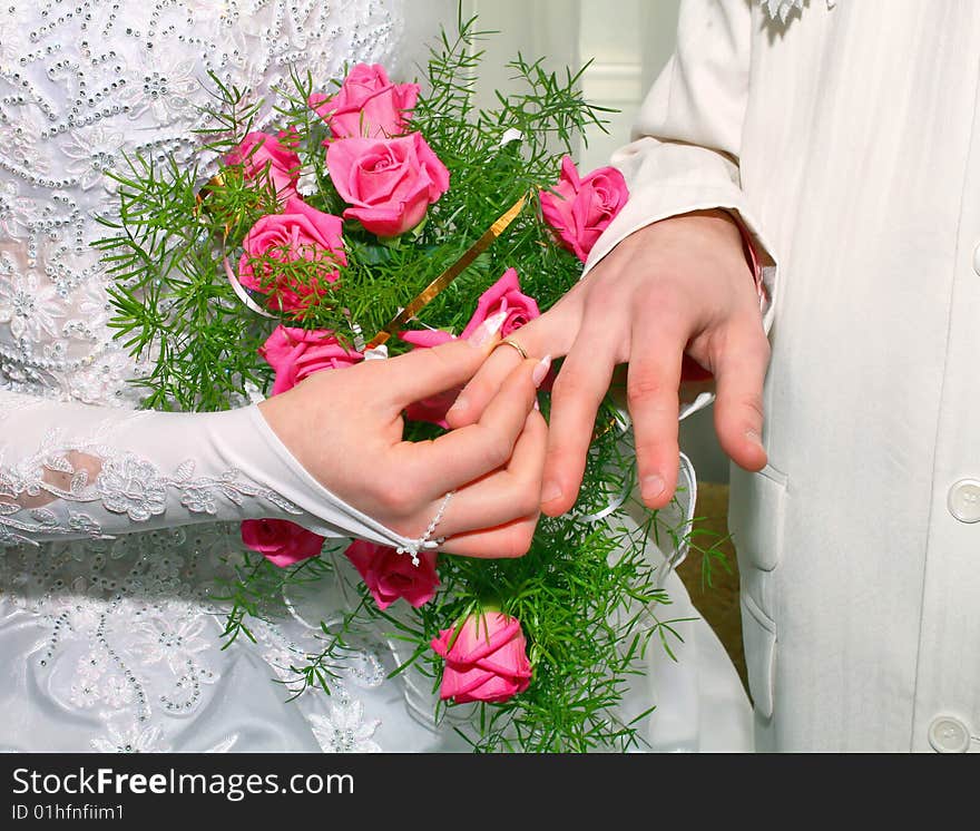 Wedding ring and bouquet for fiance and fiancee