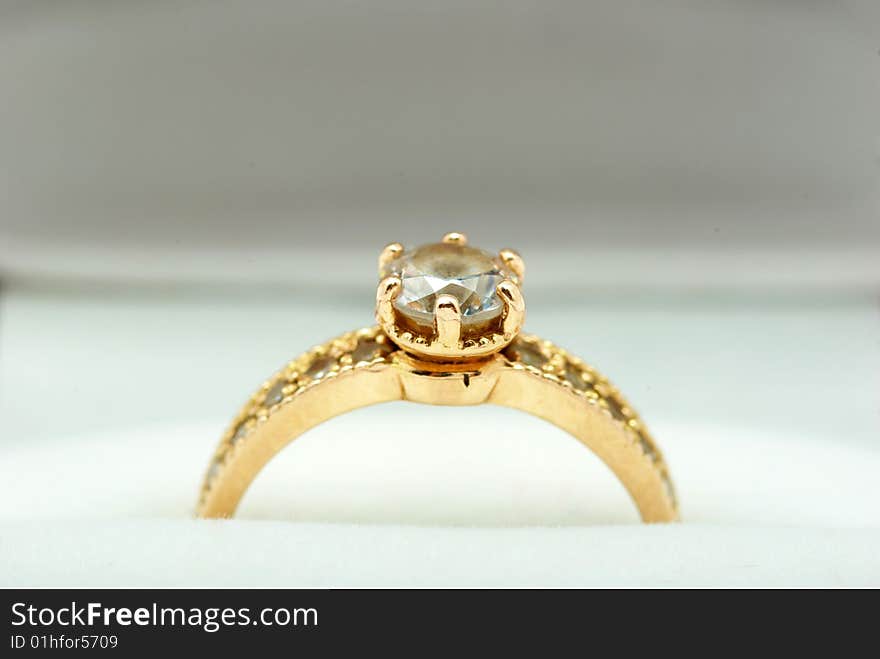 Golden ring isolated on the white background