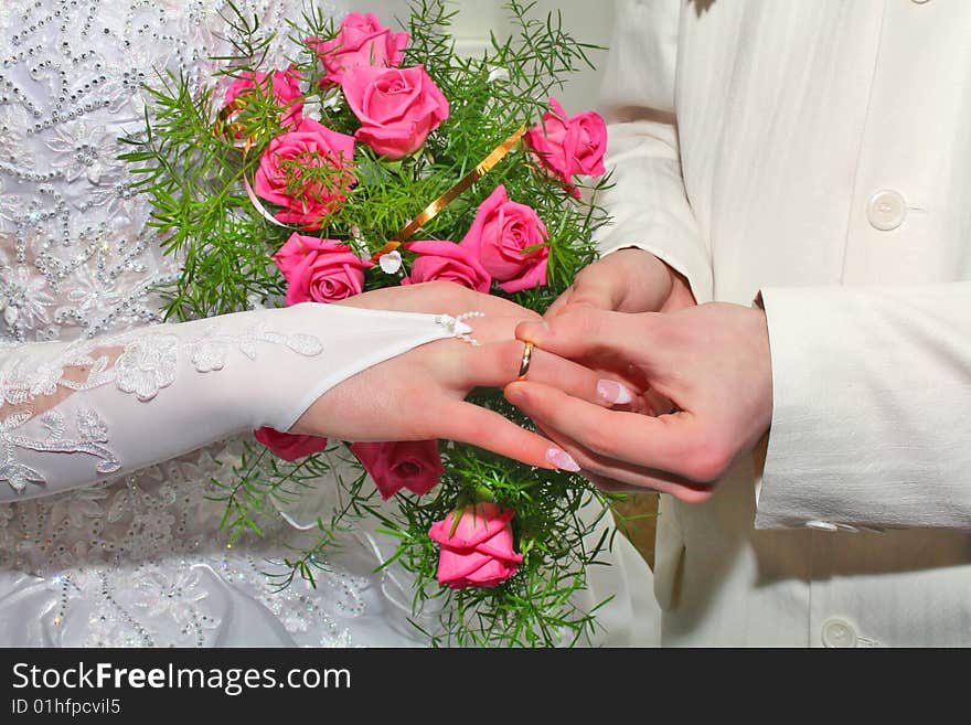 Wedding ring and bouquet for fiance and fiancee