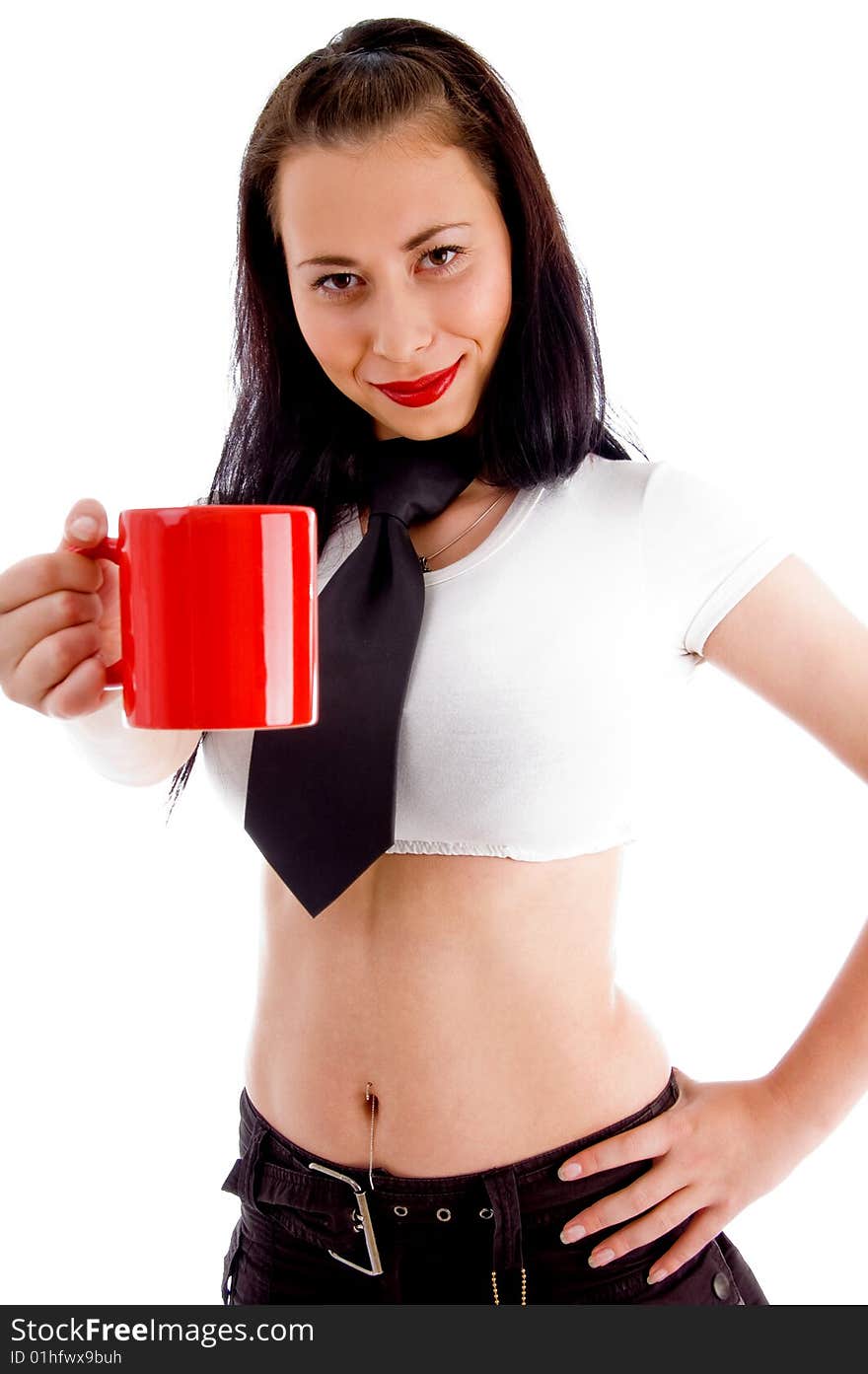 Beautiful young woman showing red coffee cup