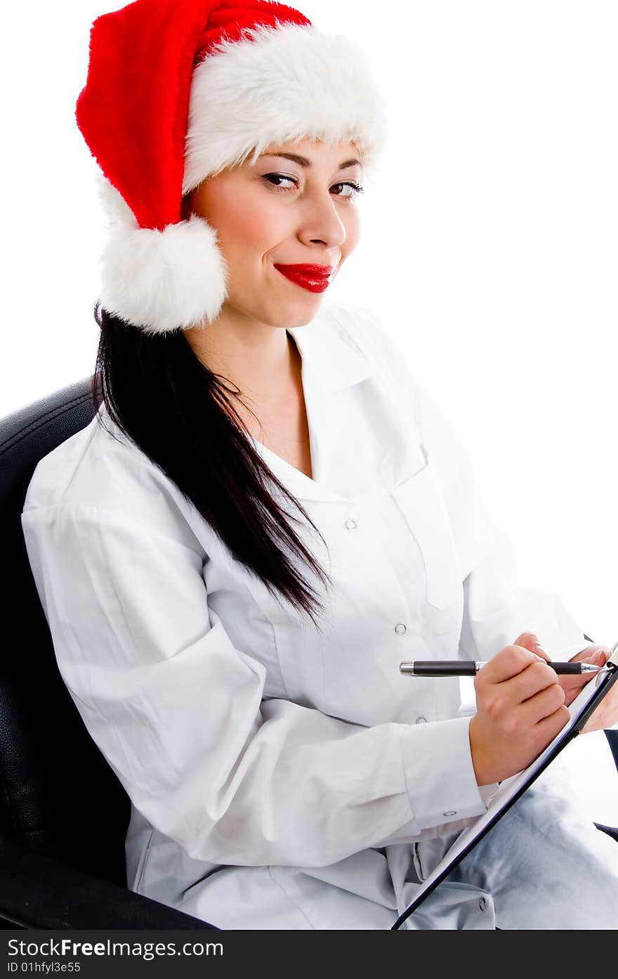 Smart doctor in christmas hat writing prescription isolated on white background