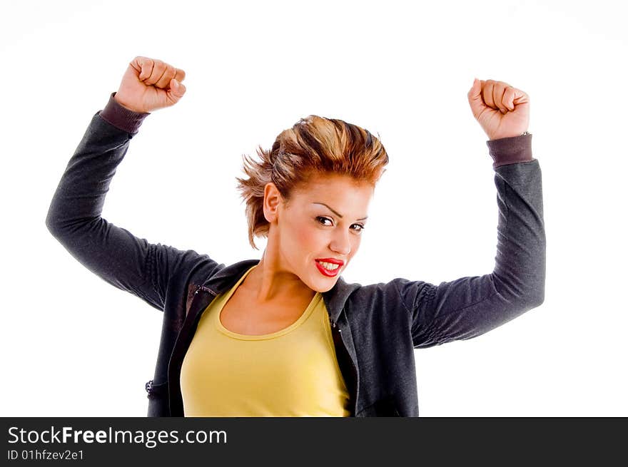 Close up of attractive woman in winning gesture on an isolated background