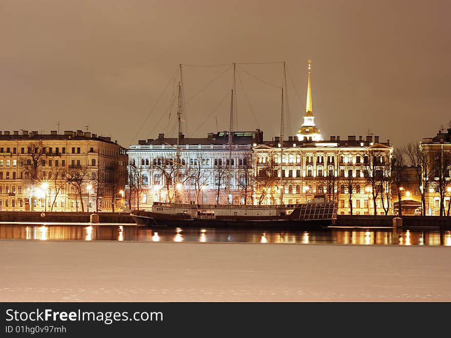 View of Saint-Petersburg in the nighttime; with frozen river on forground