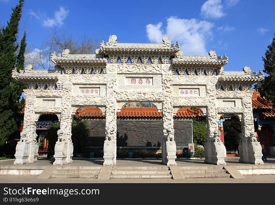 Chinese traditional gate tower with blue sky background