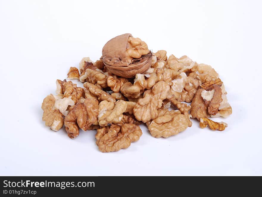 Lot of whole nuts on a white table