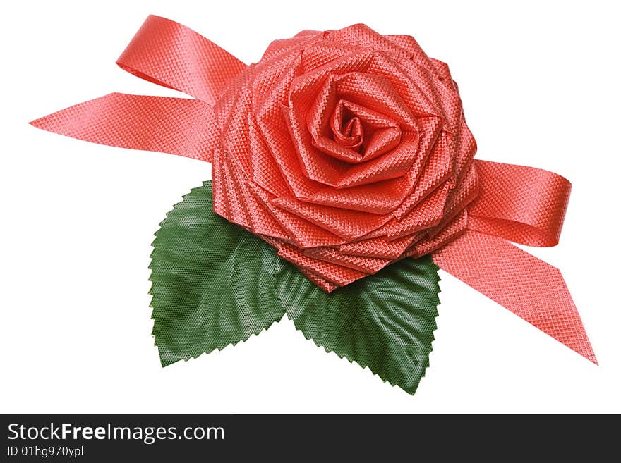 Rose from a tape for an ornament of a gift on white it is isolated. Rose from a tape for an ornament of a gift on white it is isolated