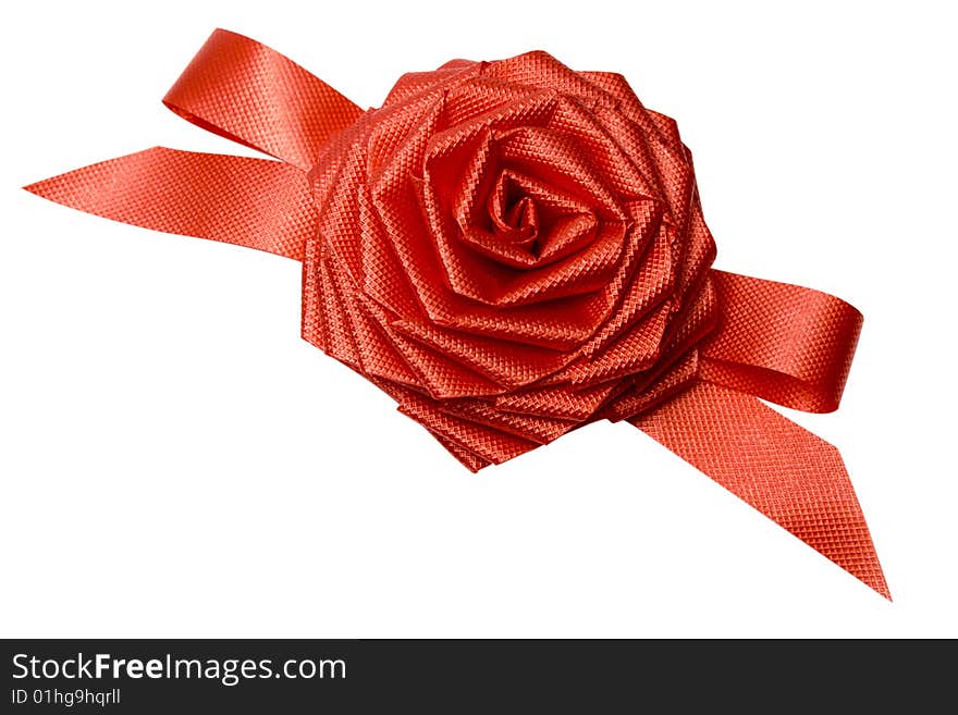 Rose from a tape for an ornament of a gift on white it is isolated. Rose from a tape for an ornament of a gift on white it is isolated