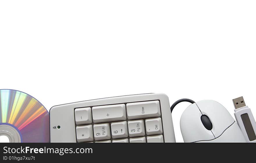 Keyboard, mouse, disc and flash on white at the bottom