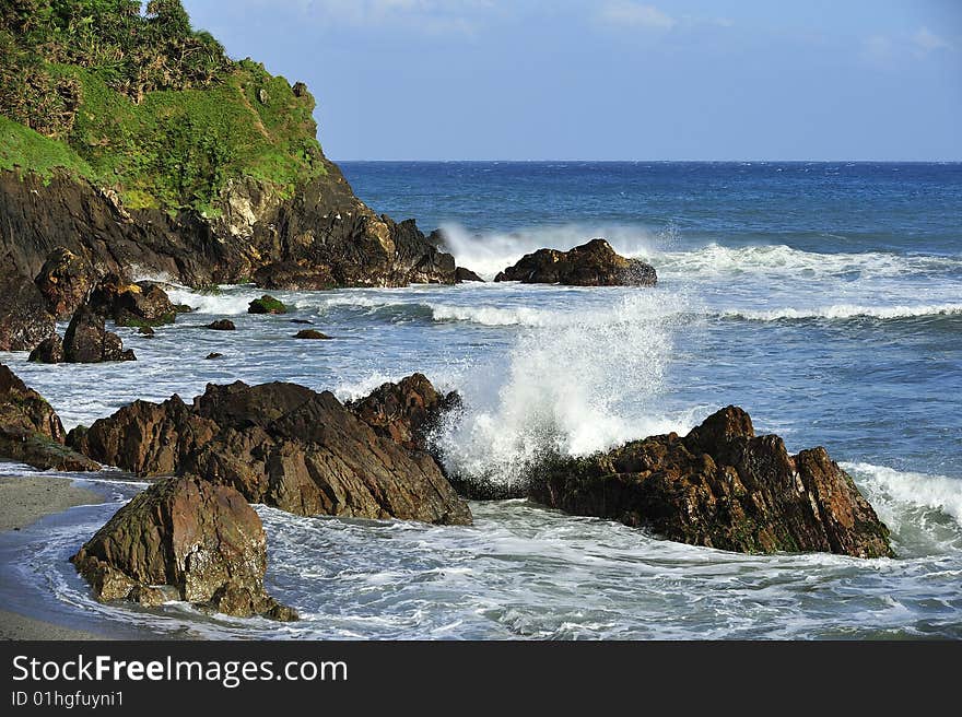 Waves hitting onto a coast. Waves hitting onto a coast