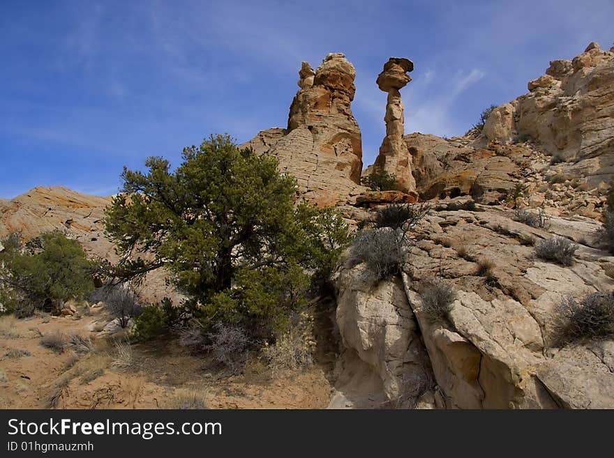 View of the red rock formations in San Rafael Swell with blue sky�s and clouds