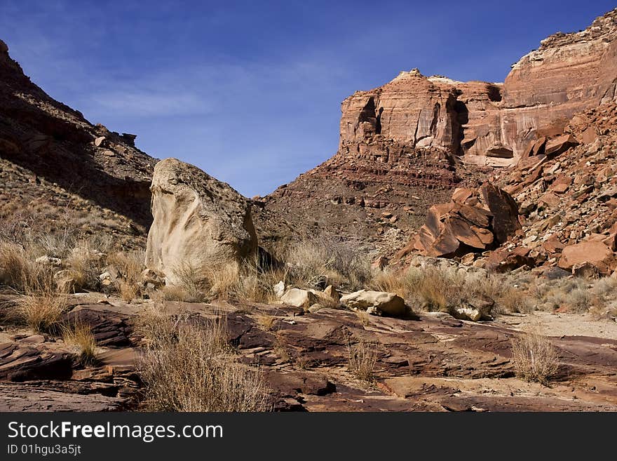 View of the red rock formations in San Rafael Swell with blue sky�s and clouds