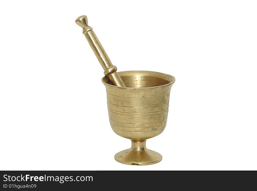 Antique brass mortar against a white background