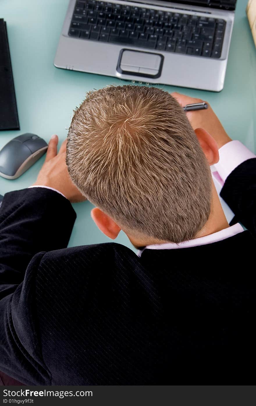 Back pose of working businessman on an isolated white background