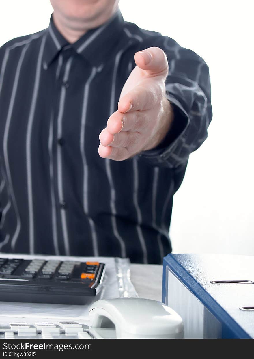 A business handshake in office on white background