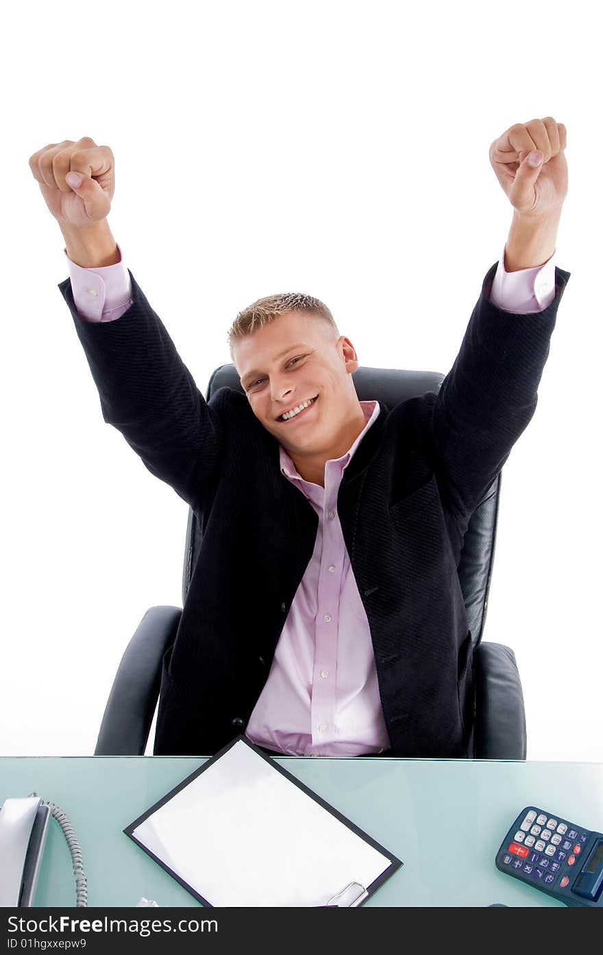 Successful businessman looking at you  on an isolated white background