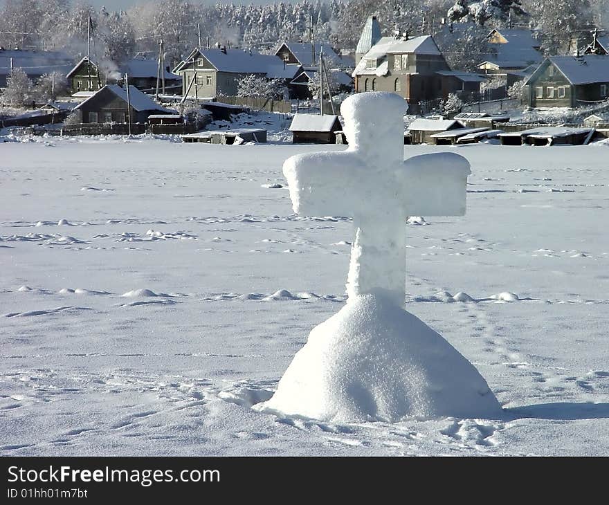 Ice cross on the Christening. Coast of Onega, Kareliya, the north of Russia