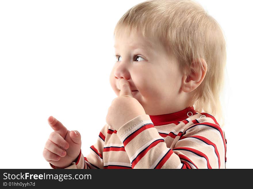 Little boy pick at his nose isolated on white background