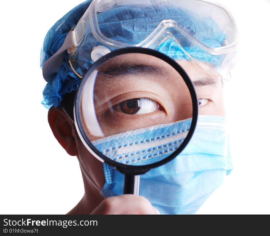 Doctor holding magnifier on an isolated white background