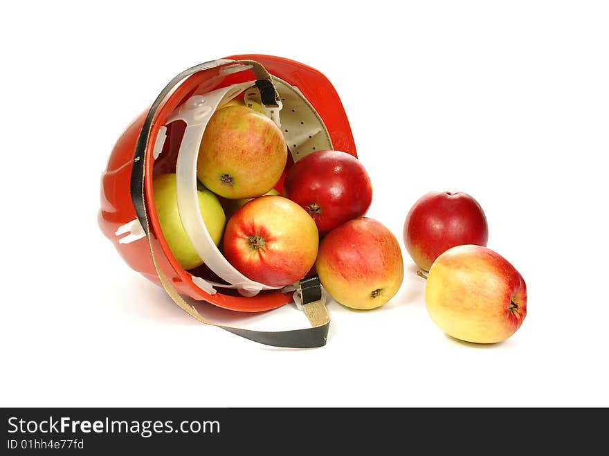 Apples in a helmet on a white background