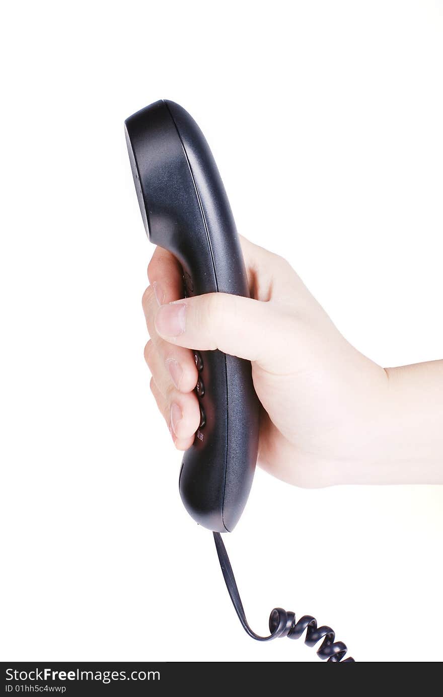 Black telephone receiver in hand