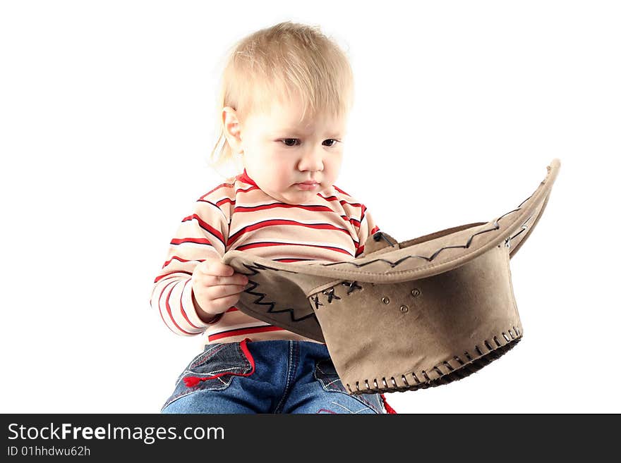 Little boy in cowboy hat isolated on white background