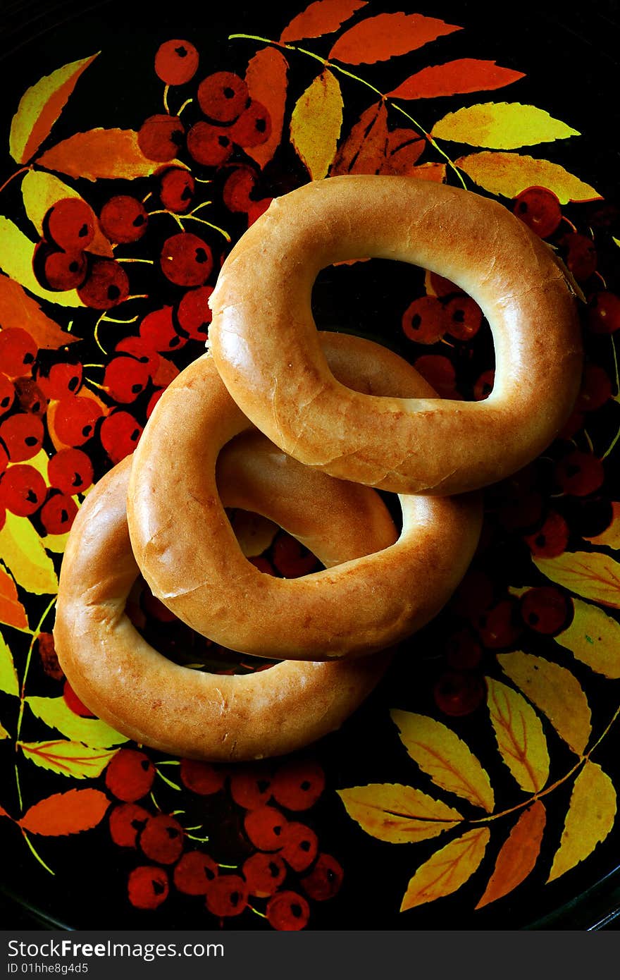 Bagels on tray with mountain ash pattern