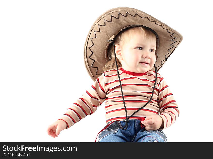 Little boy in cowboy hat isolated on white background