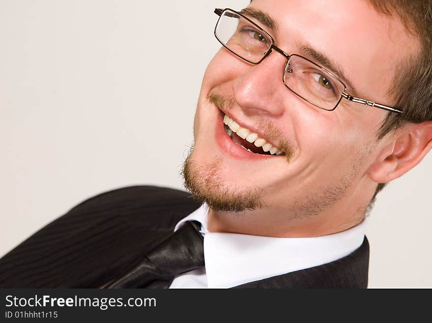 Handsome and cheerful young businessman portrait