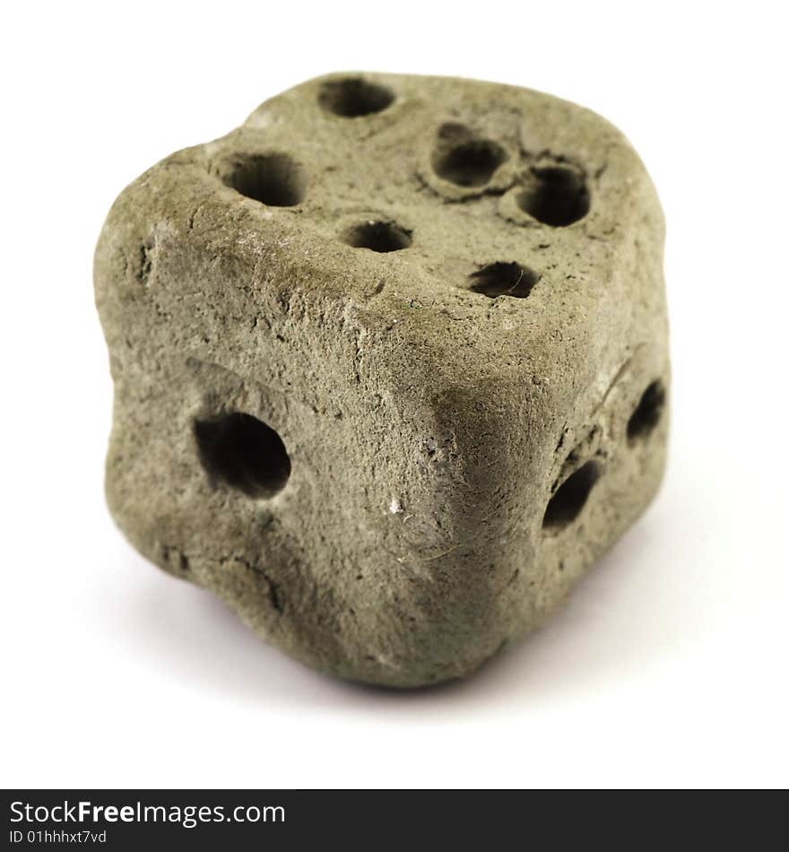 Clay die modeled by a child