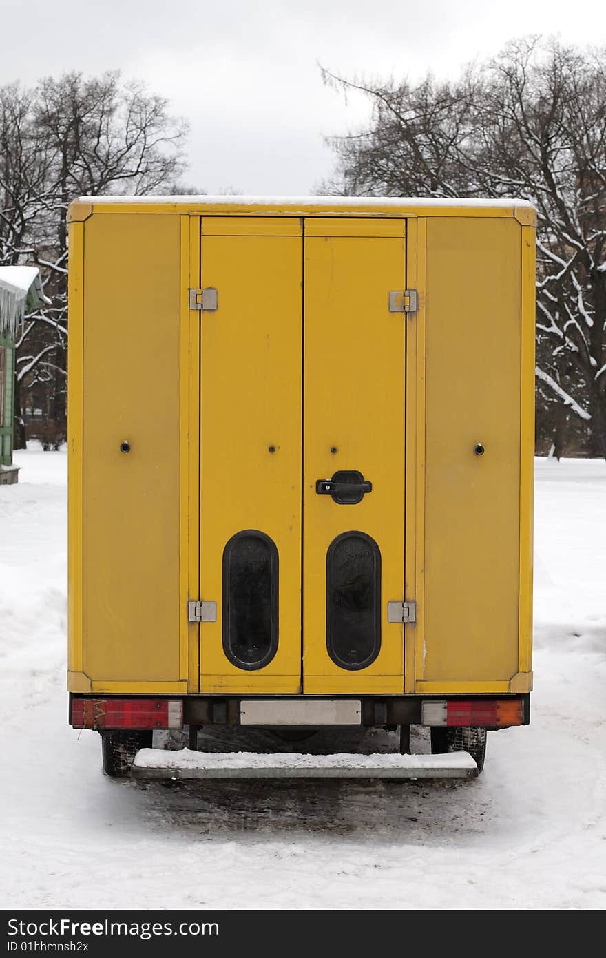 Old rusted mail delivery truck at winter