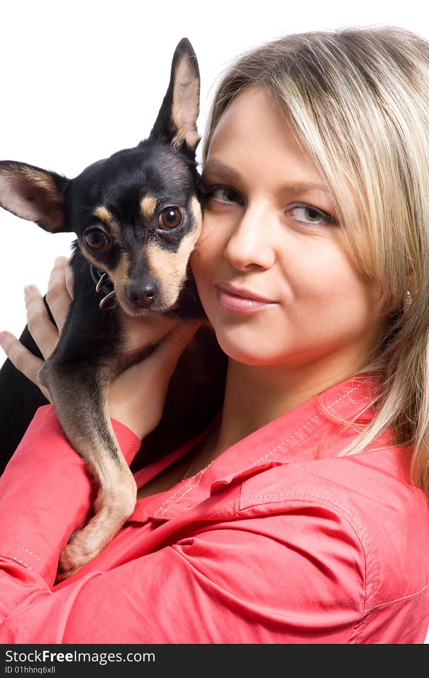 Young woman is embracing small dog (toy-terrier). Young woman is embracing small dog (toy-terrier)