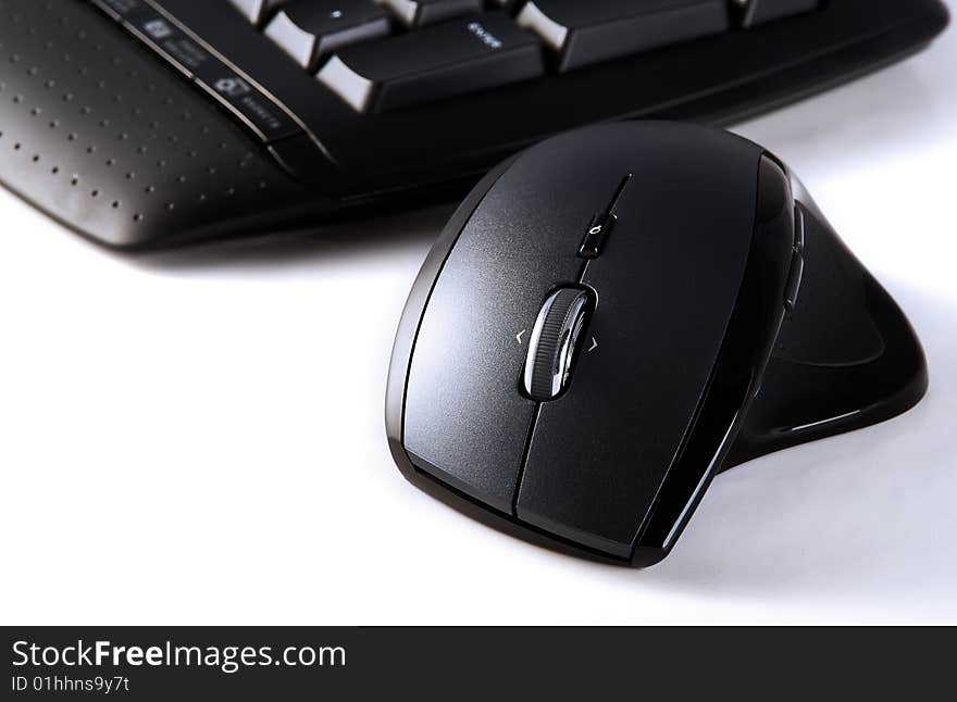 Close up of keyboard and mouse on white background