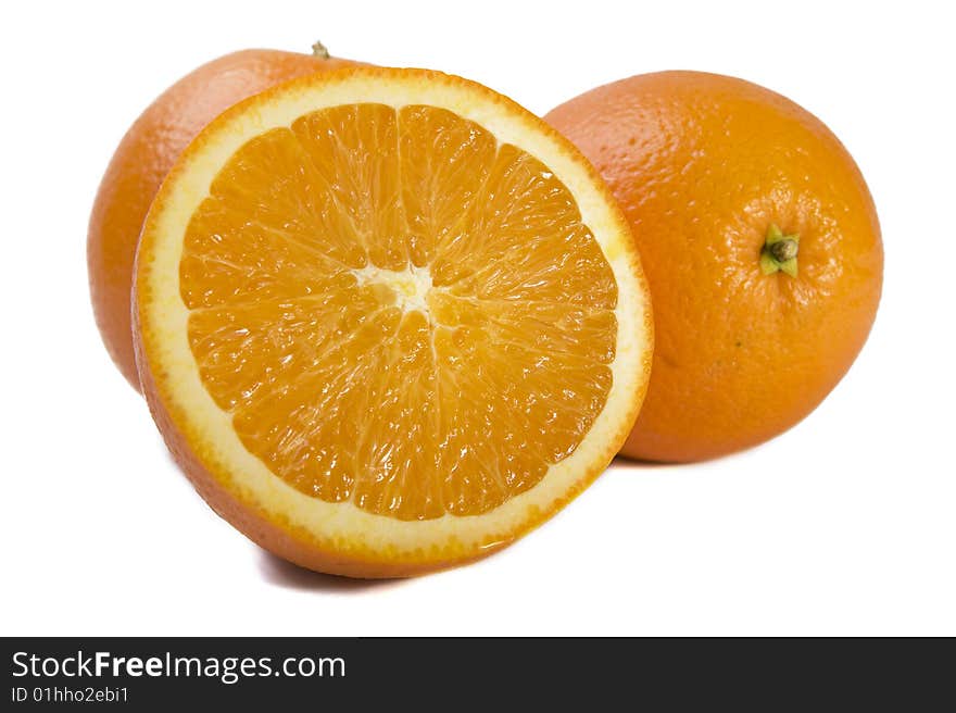 Three Fresh Oranges On White Background