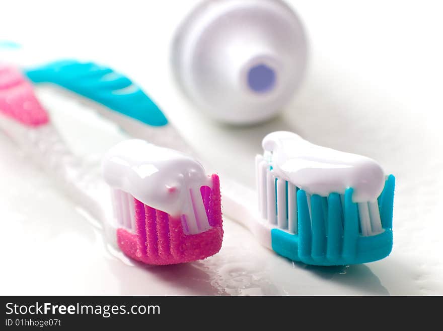 Toothpaste and toothbrushes closeup. dental care